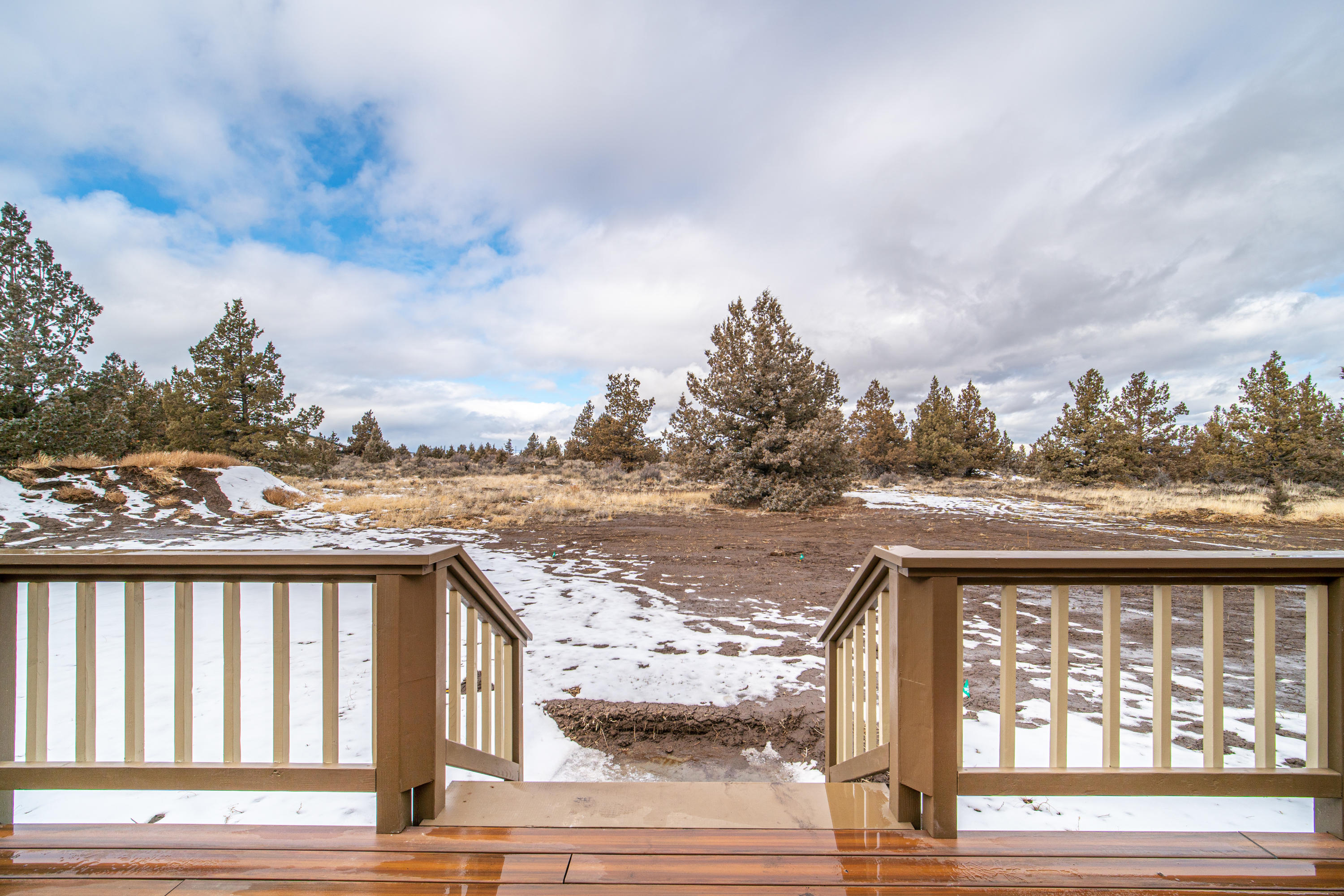 62089 Torkelson Road Bend, OR 97701 - Photo 9 of 33 Back Deck (Mountain views not visible today due to clouds)