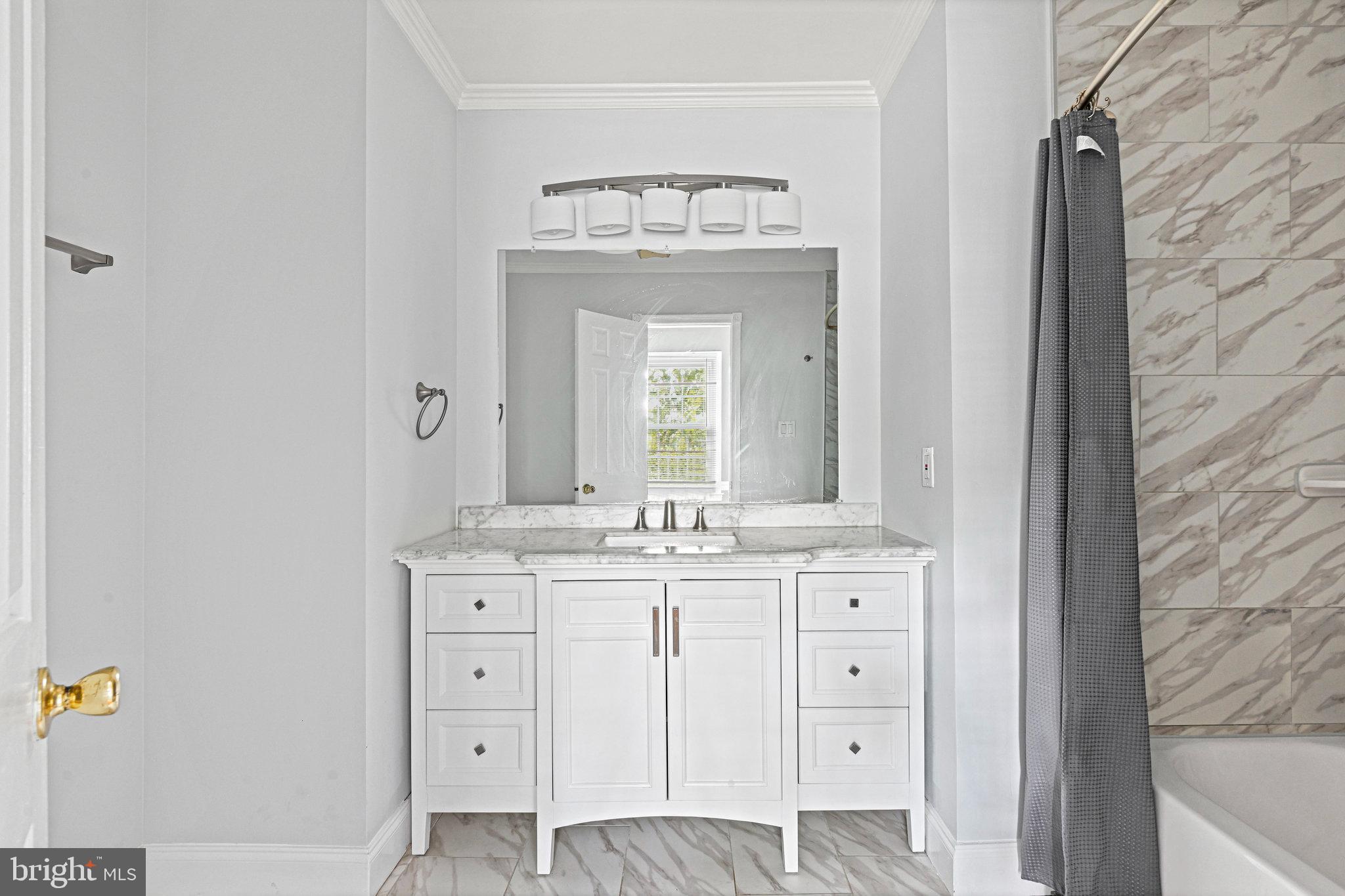 13345 Point Rider Lane Herndon, VA 20171 - Photo 26 of 43 a bathroom with a granite countertop sink and a mirror