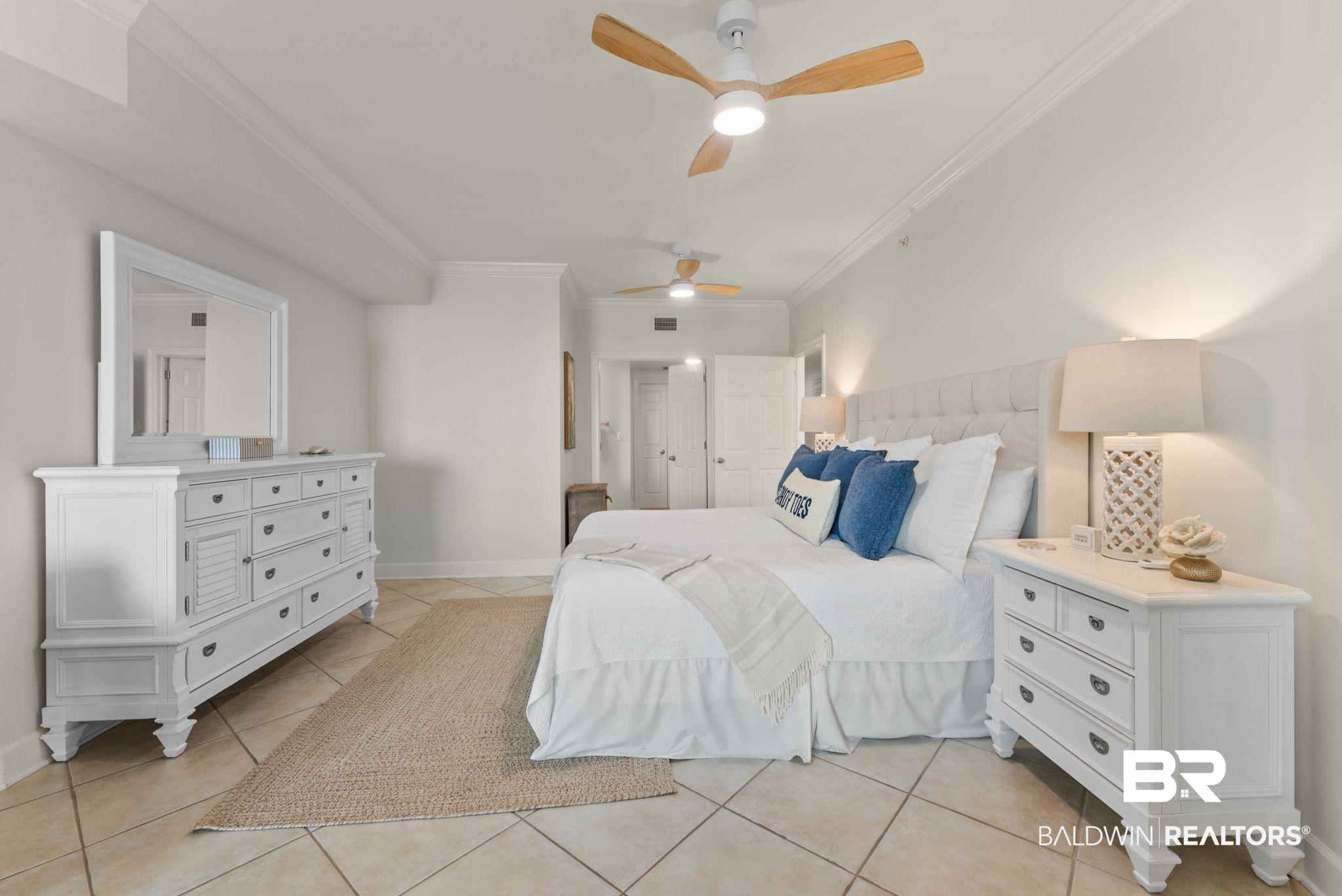 27580 Canal Road, Unit 1233 Orange Beach, AL 36561 - Photo 28 of 79 Bedroom featuring ornamental molding, ceiling fan, and light tile patterned flooring