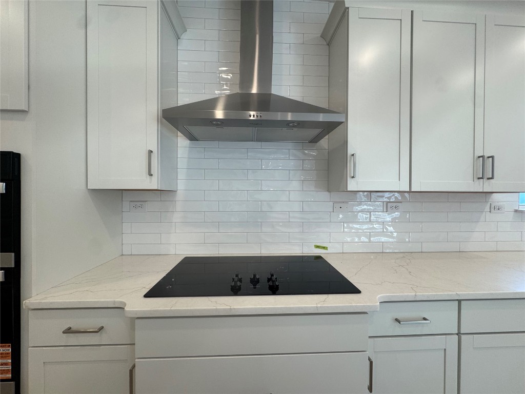 96112 Pirates Bluff Road Yulee, FL 32097 - Photo 5 of 10 a kitchen with a sink and cabinets