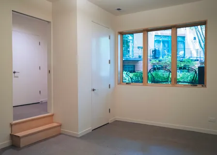 an empty room with window