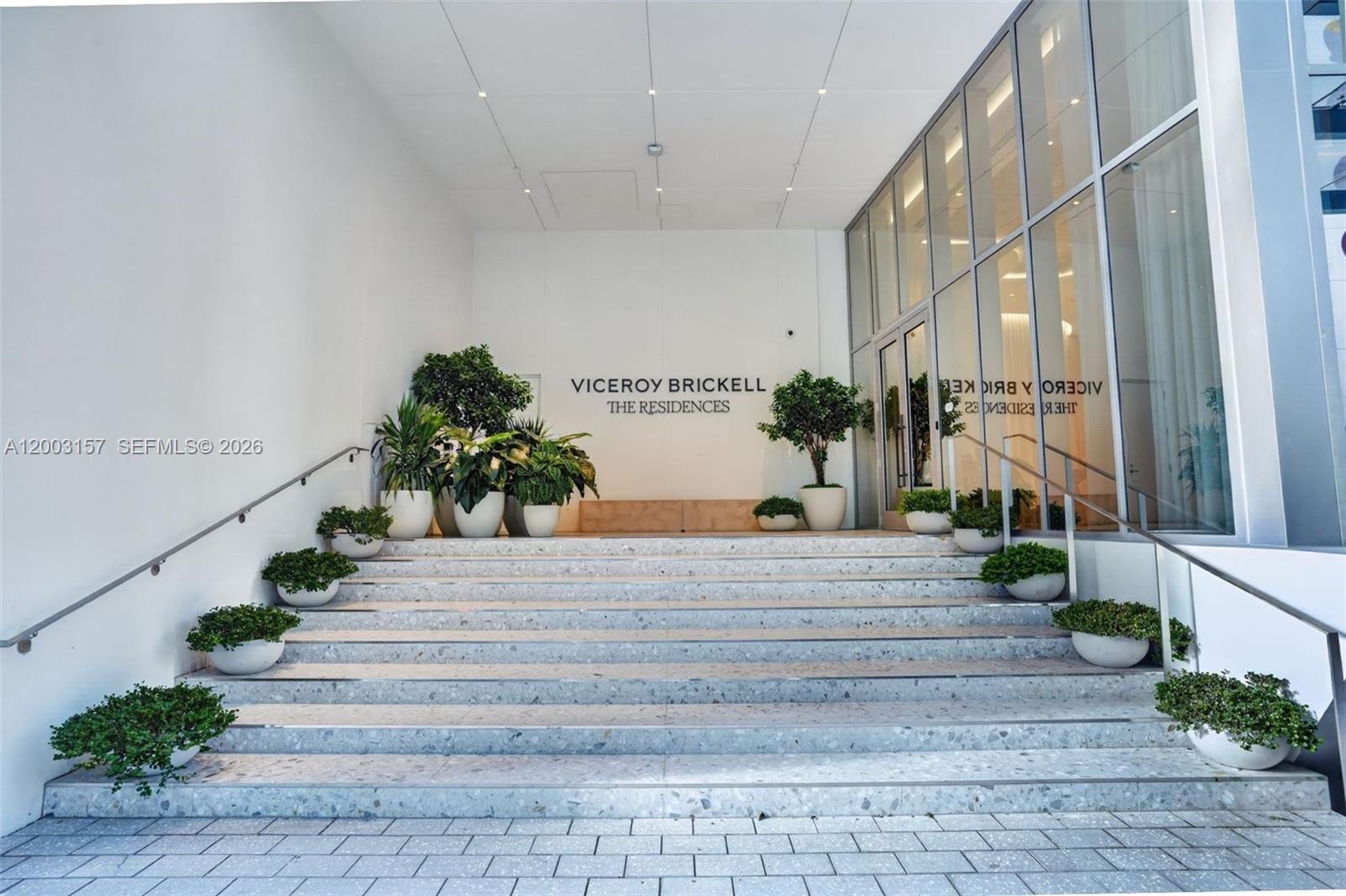 77 Southeast 5th Street, Unit 2705 Miami, FL 33131 - Photo 15 of 45 a building exterior with stairs