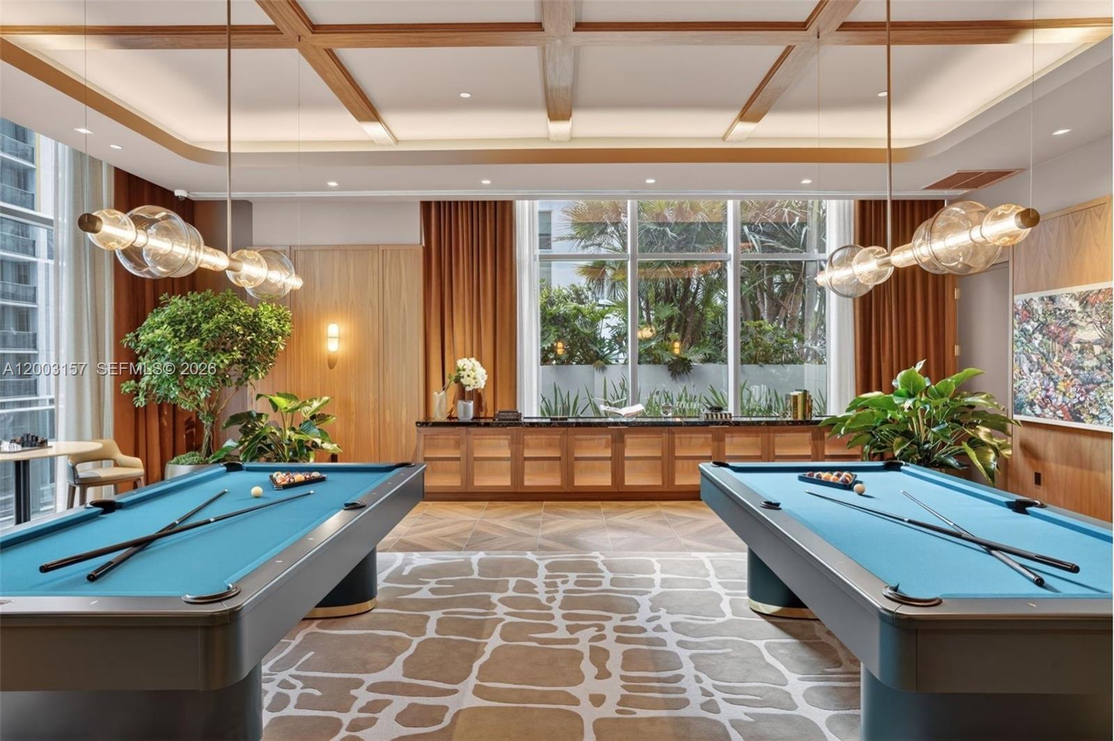 77 Southeast 5th Street, Unit 2705 Miami, FL 33131 - Photo 30 of 45 a room with pool table and windows