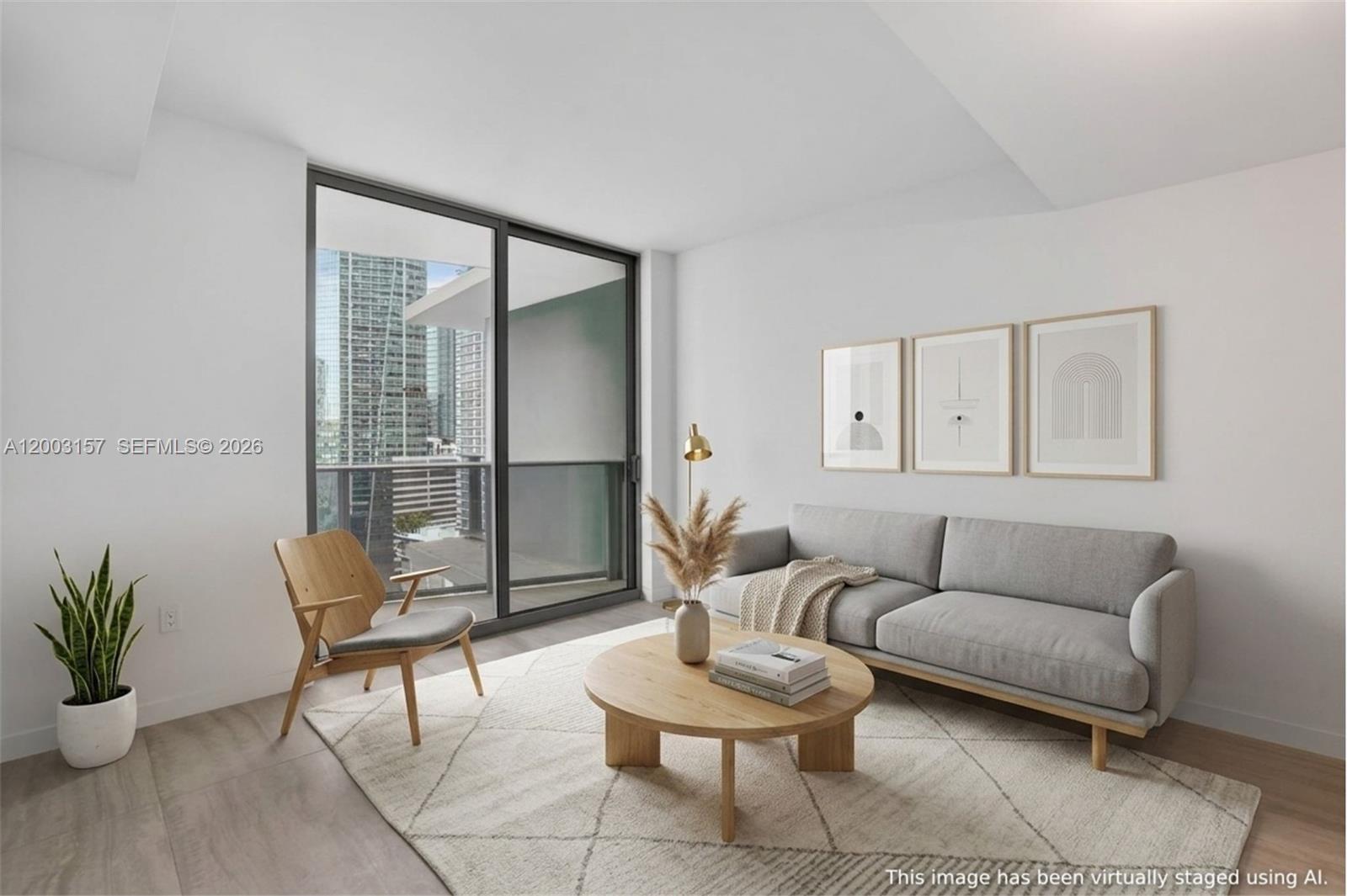 77 Southeast 5th Street, Unit 2705 Miami, FL 33131 - Photo 8 of 45 a living room with furniture and a potted plant