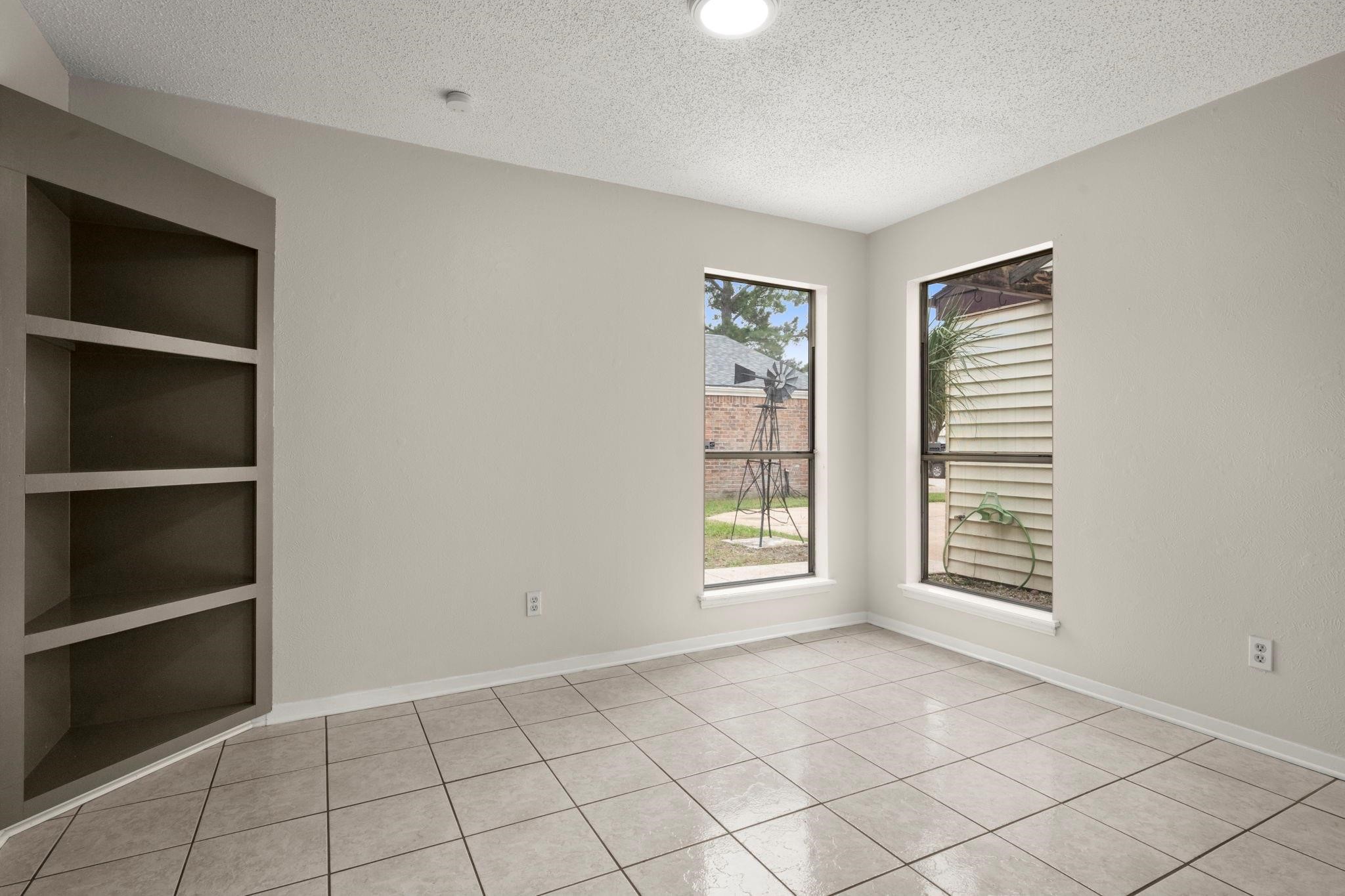 11718 Ridge Run Drive Houston, TX 77064 - Photo 6 of 17 a view of an empty room with a window