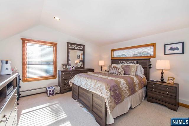 551 Washington Street, Unit 2 Carlstadt, NJ 07072 - Photo 11 of 19 a bedroom with a bed and a window