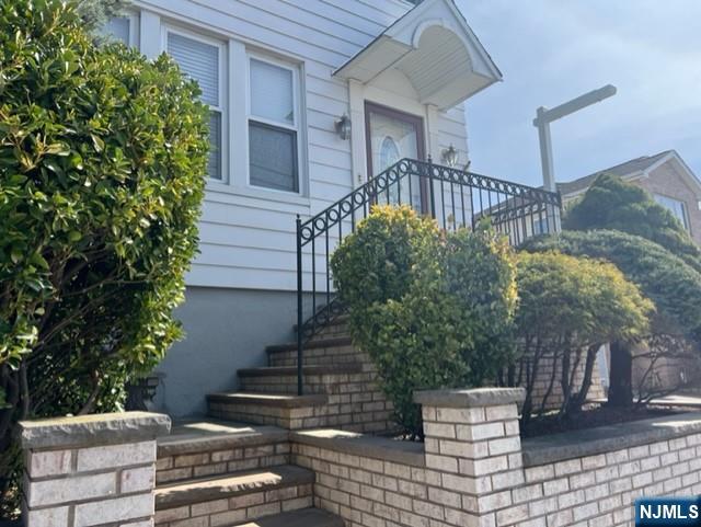 551 Washington Street, Unit 2 Carlstadt, NJ 07072 - Photo 18 of 19 a view of house with outdoor space and sitting area