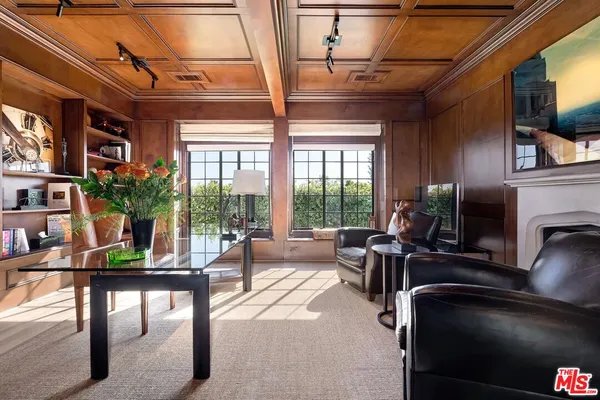 a living room with patio furniture