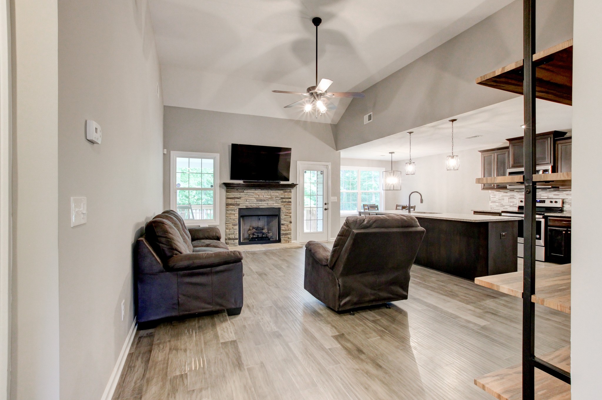 825 Rushing Drive Clarksville, TN 37042 - Photo 19 of 70 a living room with furniture and a flat screen tv