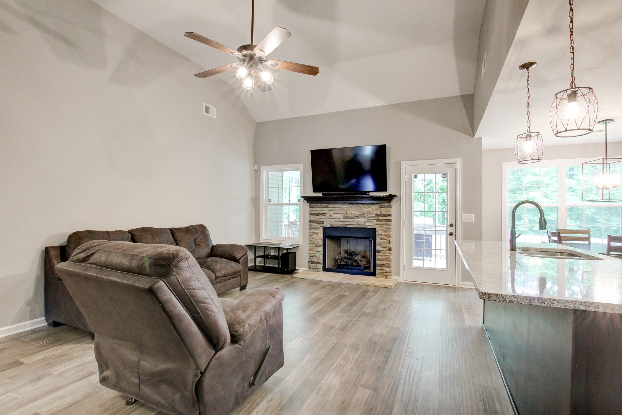 825 Rushing Drive Clarksville, TN 37042 - Photo 21 of 70 a living room with furniture fireplace and flat screen tv