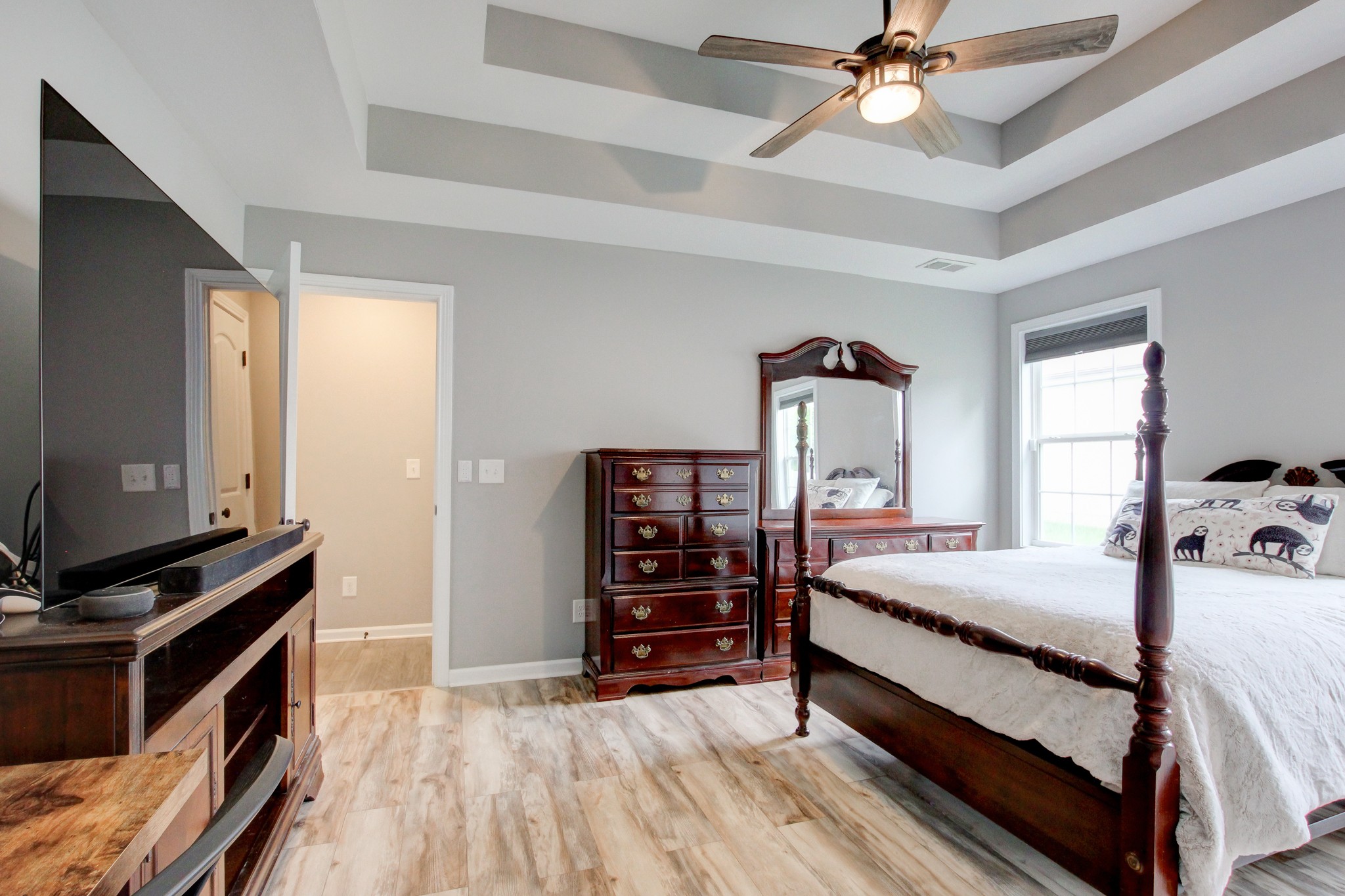825 Rushing Drive Clarksville, TN 37042 - Photo 51 of 70 a bedroom with a bed and a flat tv screen