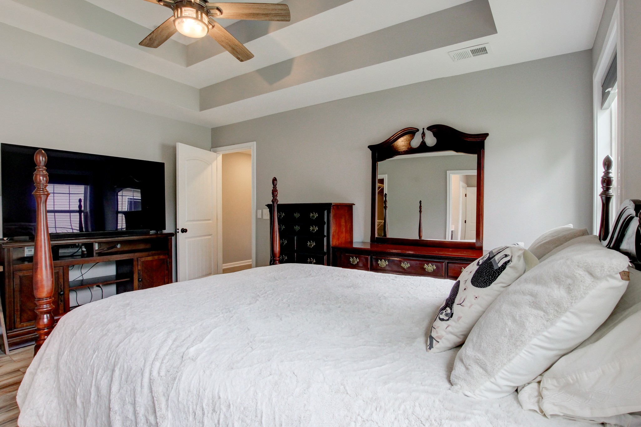 825 Rushing Drive Clarksville, TN 37042 - Photo 53 of 70 a bedroom with a bed and a flat screen tv