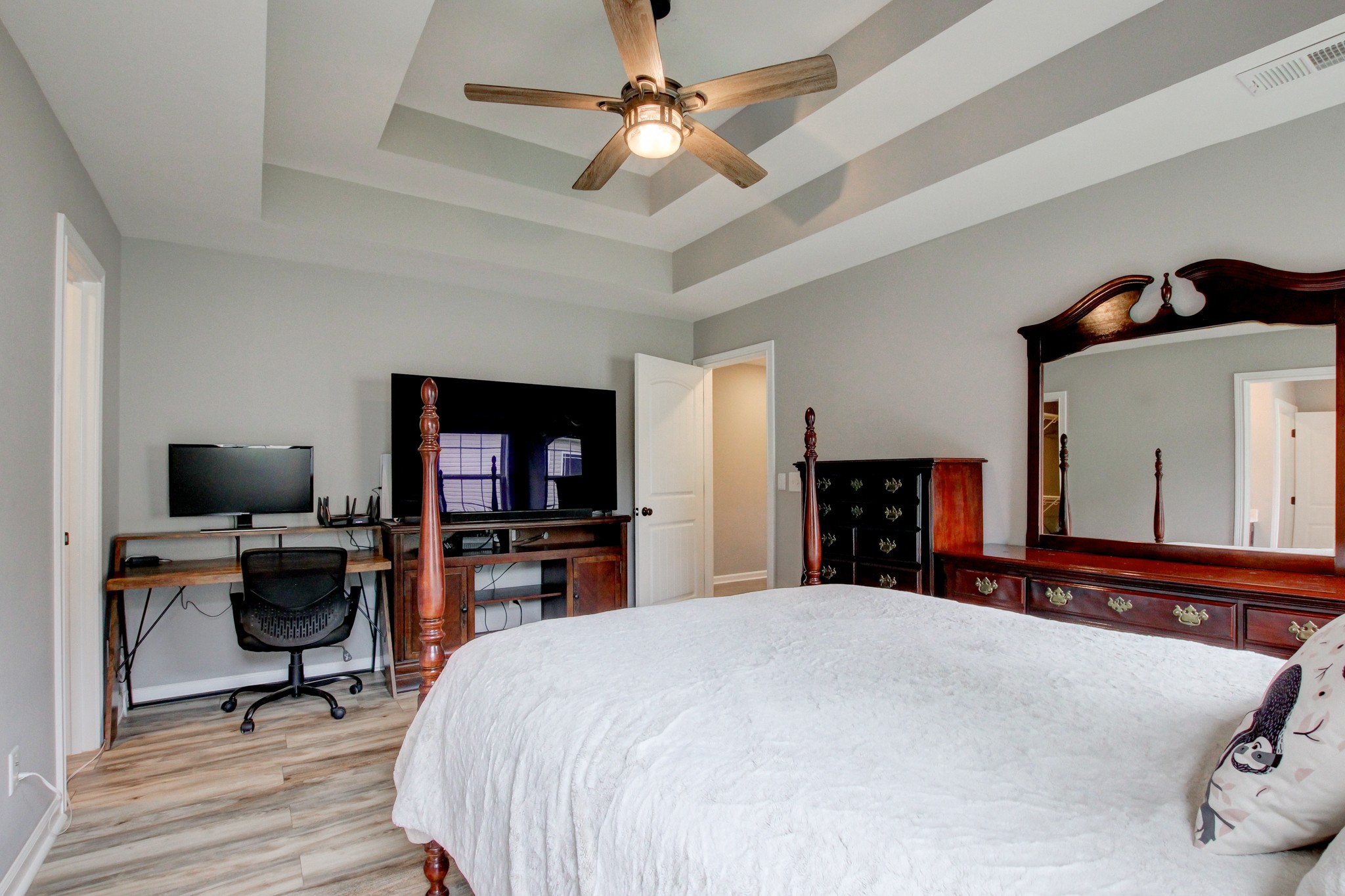 825 Rushing Drive Clarksville, TN 37042 - Photo 54 of 70 a bedroom with a bed and a flat screen tv