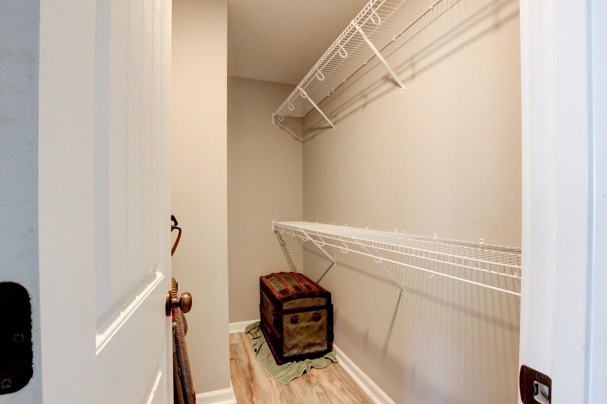 825 Rushing Drive Clarksville, TN 37042 - Photo 57 of 70 a view of walk in closet with clothes and shoes