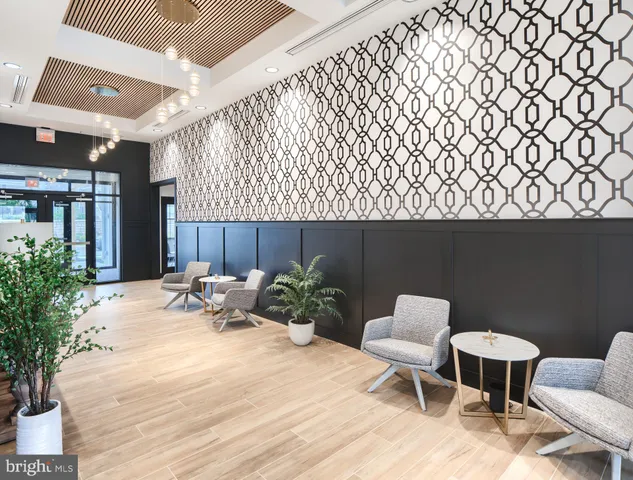 a view of a chairs and table in patio