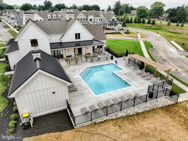 a view of a house with swimming pool