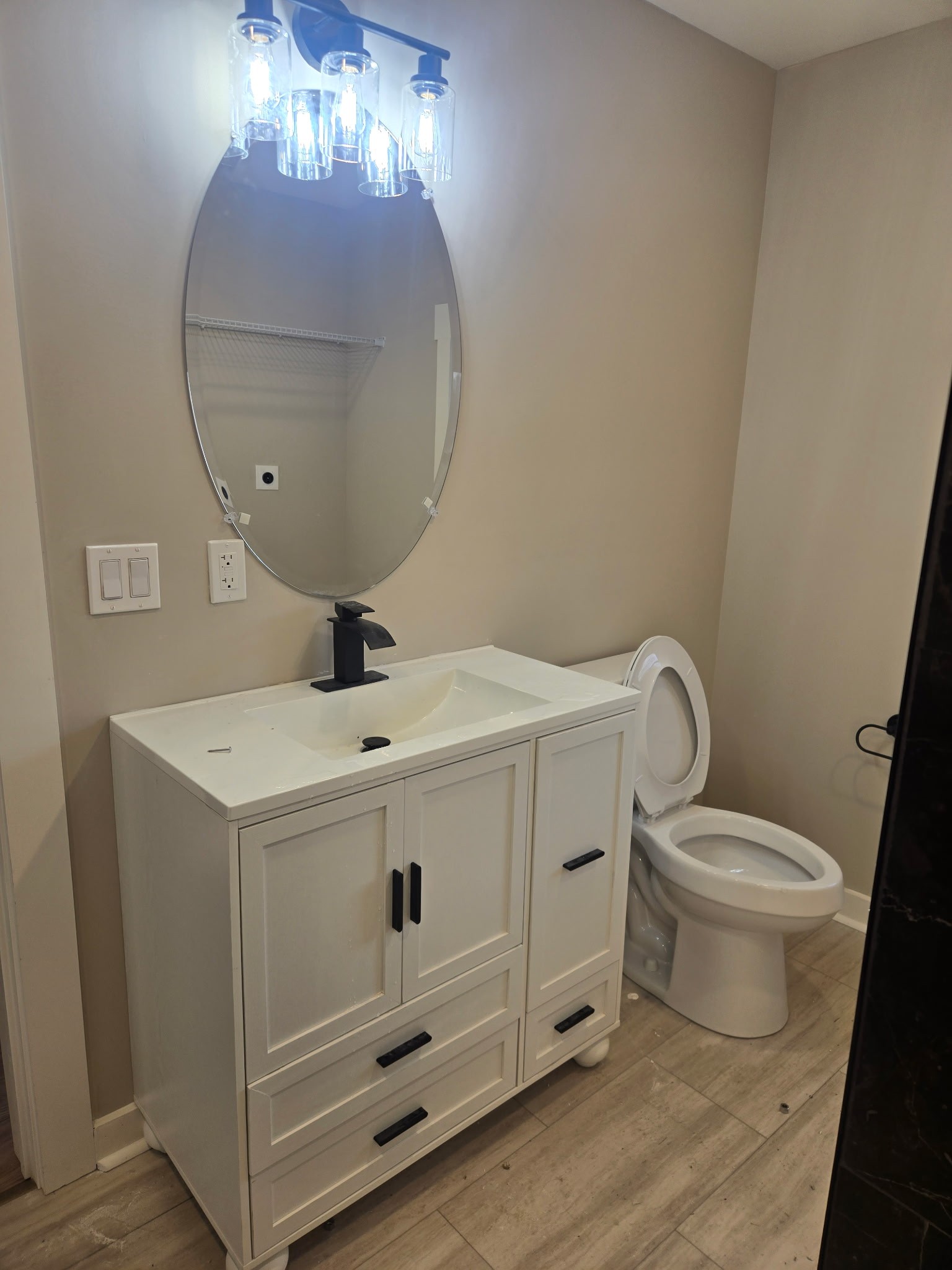 946 Clearview Road Cottontown, TN 37048 - Photo 13 of 33 a bathroom with a sink a toilet and a mirror