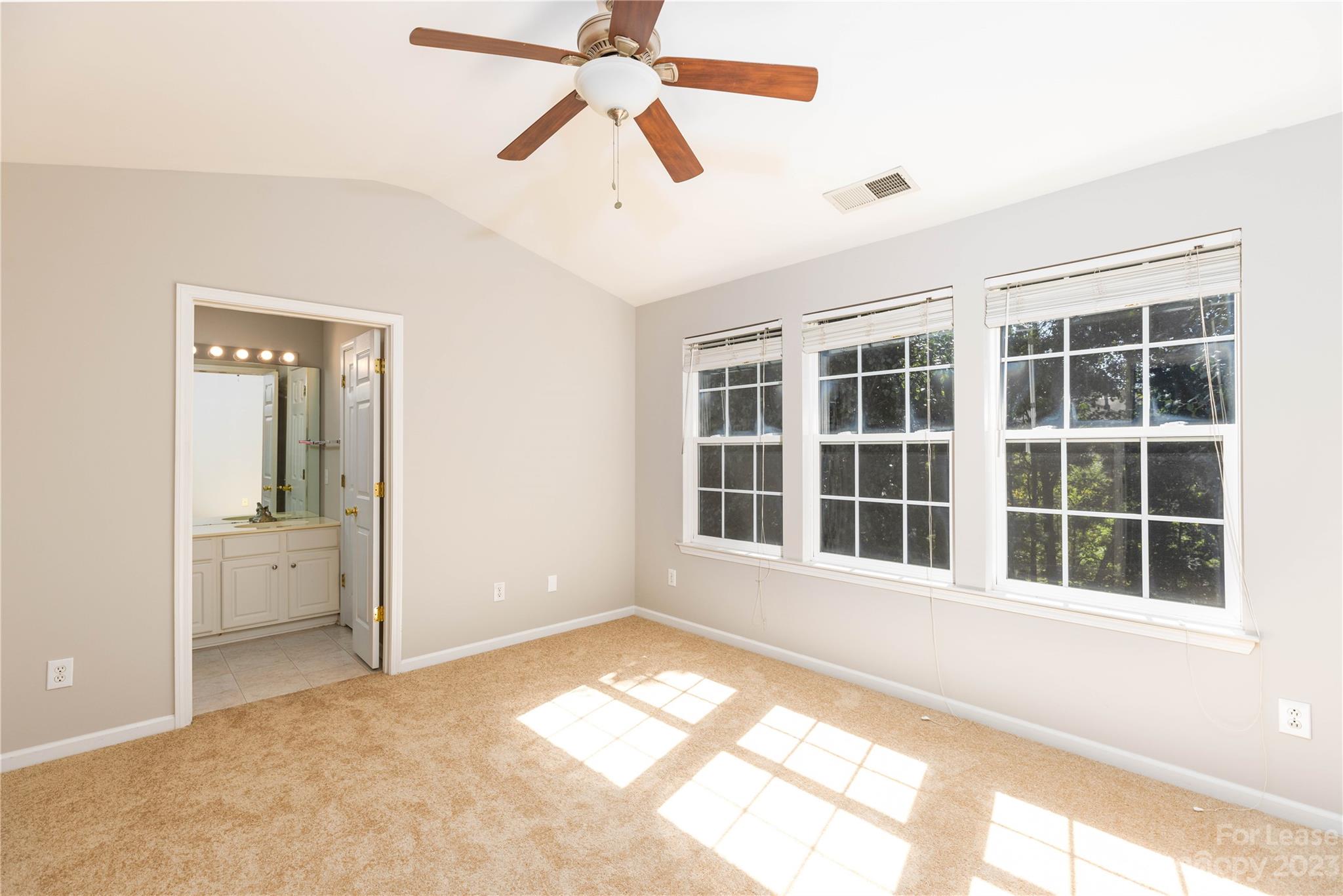 6879 Rothchild Drive Charlotte, NC 28270 - Photo 12 of 19 a view of empty room with windows