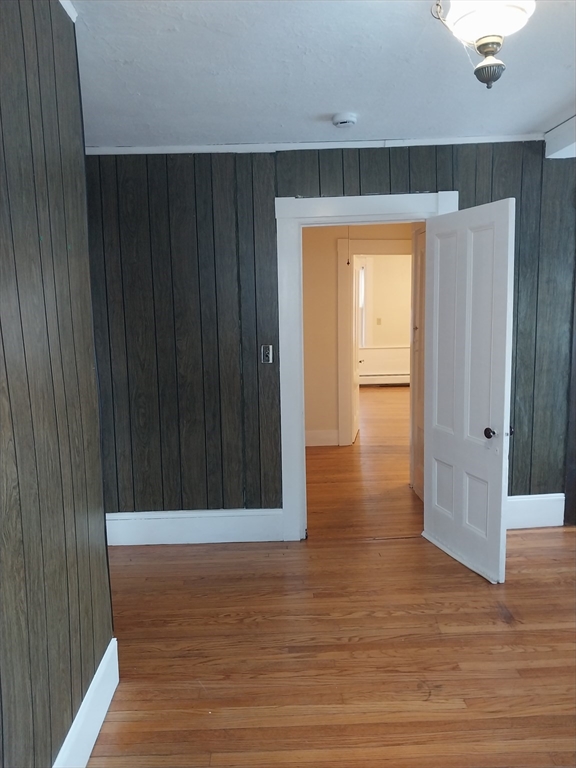 49 Salem Street, Unit 1 Haverhill, MA 01835 - Photo 11 of 16 a view of hallway with wooden floor
