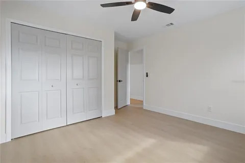 a view of an empty room with a large window