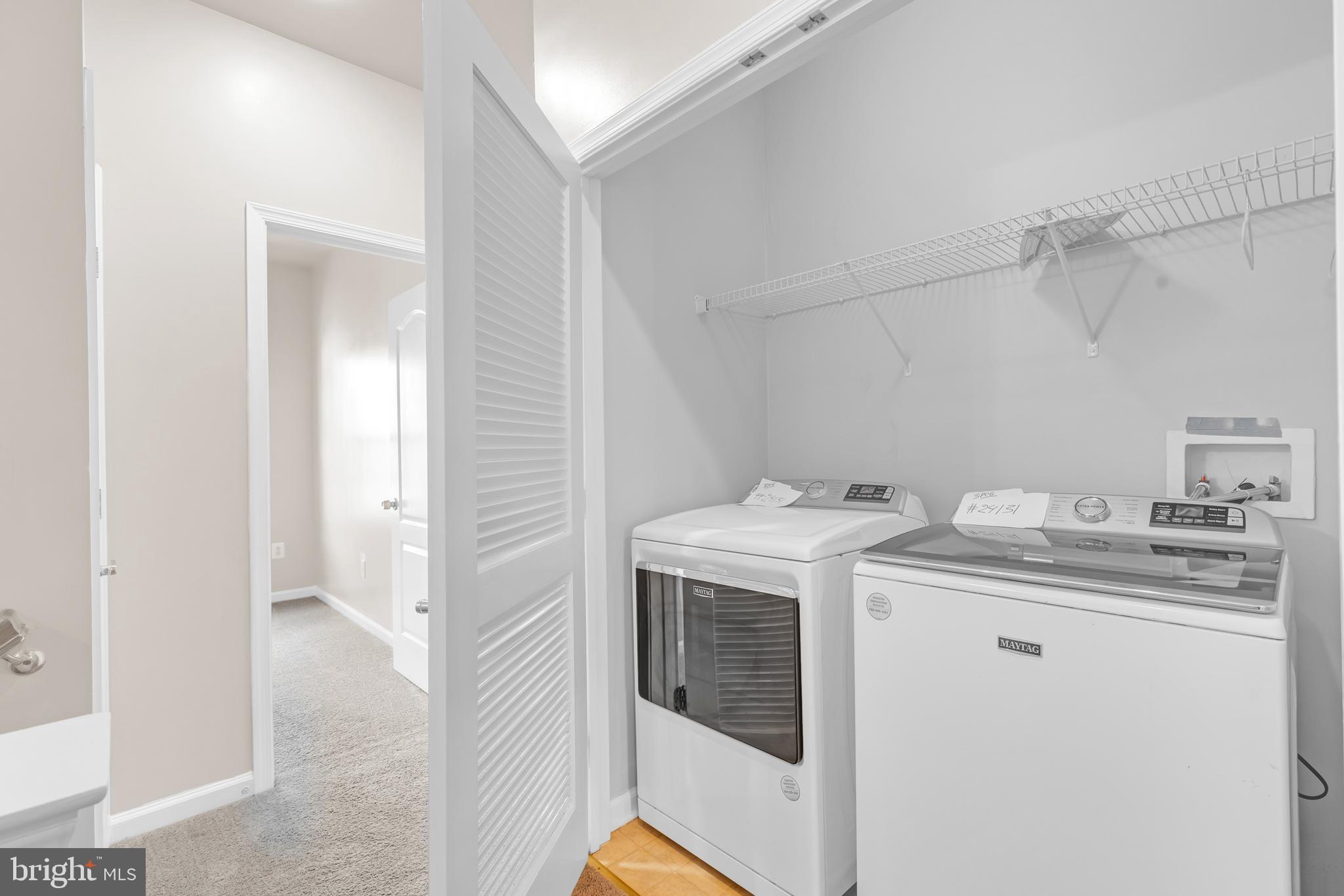 626 Tailgate Terrace Landover, MD 20785 - Photo 17 of 36 a utility room with dryer and washer