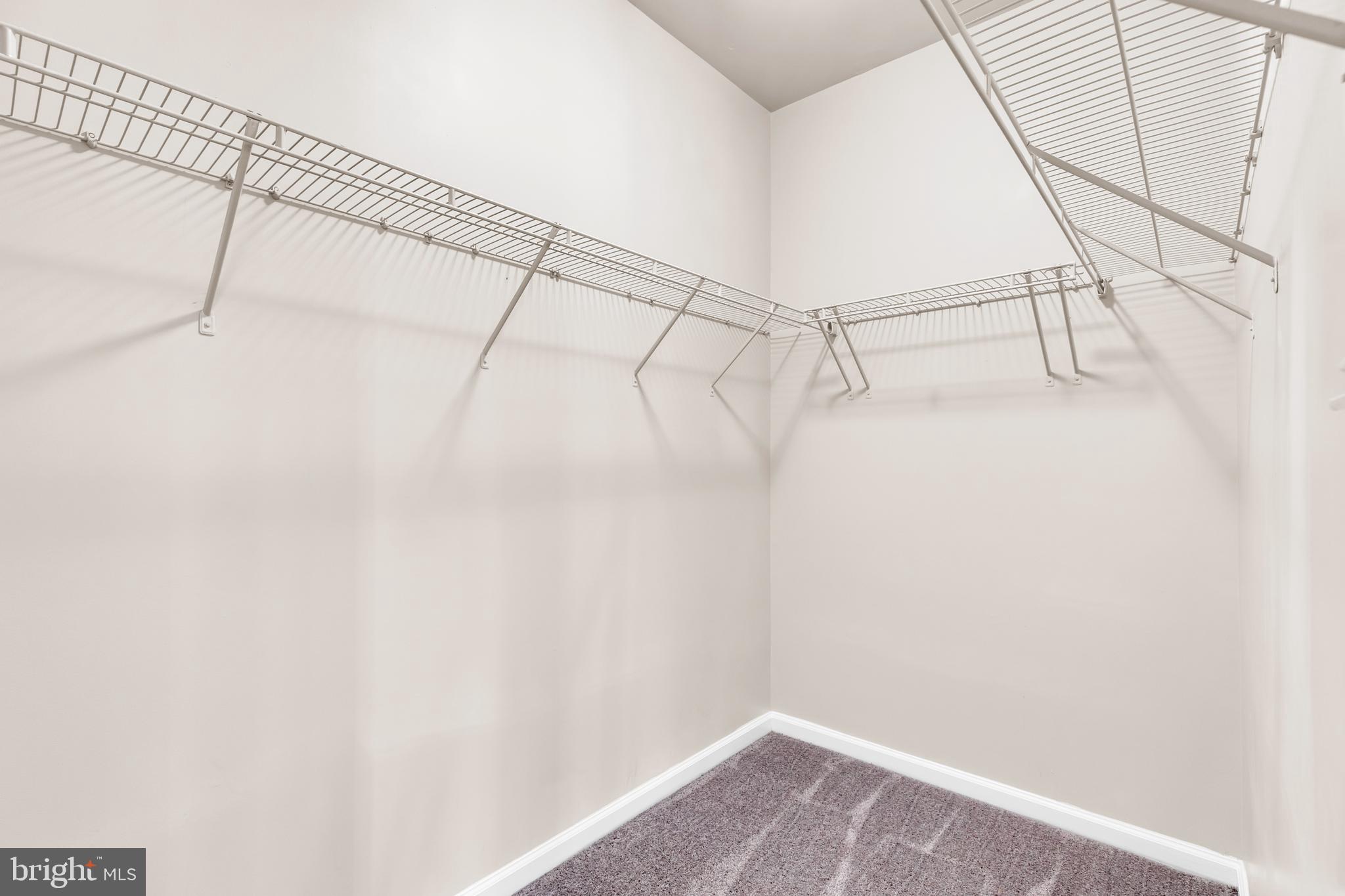 626 Tailgate Terrace Landover, MD 20785 - Photo 23 of 36 a view of a room with racks on the wall