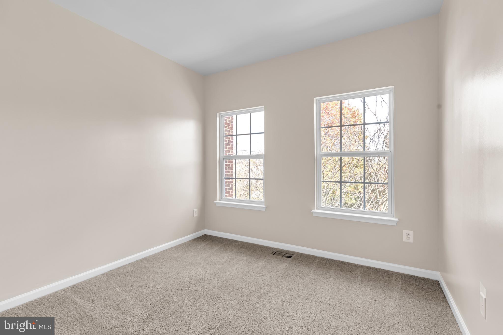 626 Tailgate Terrace Landover, MD 20785 - Photo 24 of 36 an empty room with a window