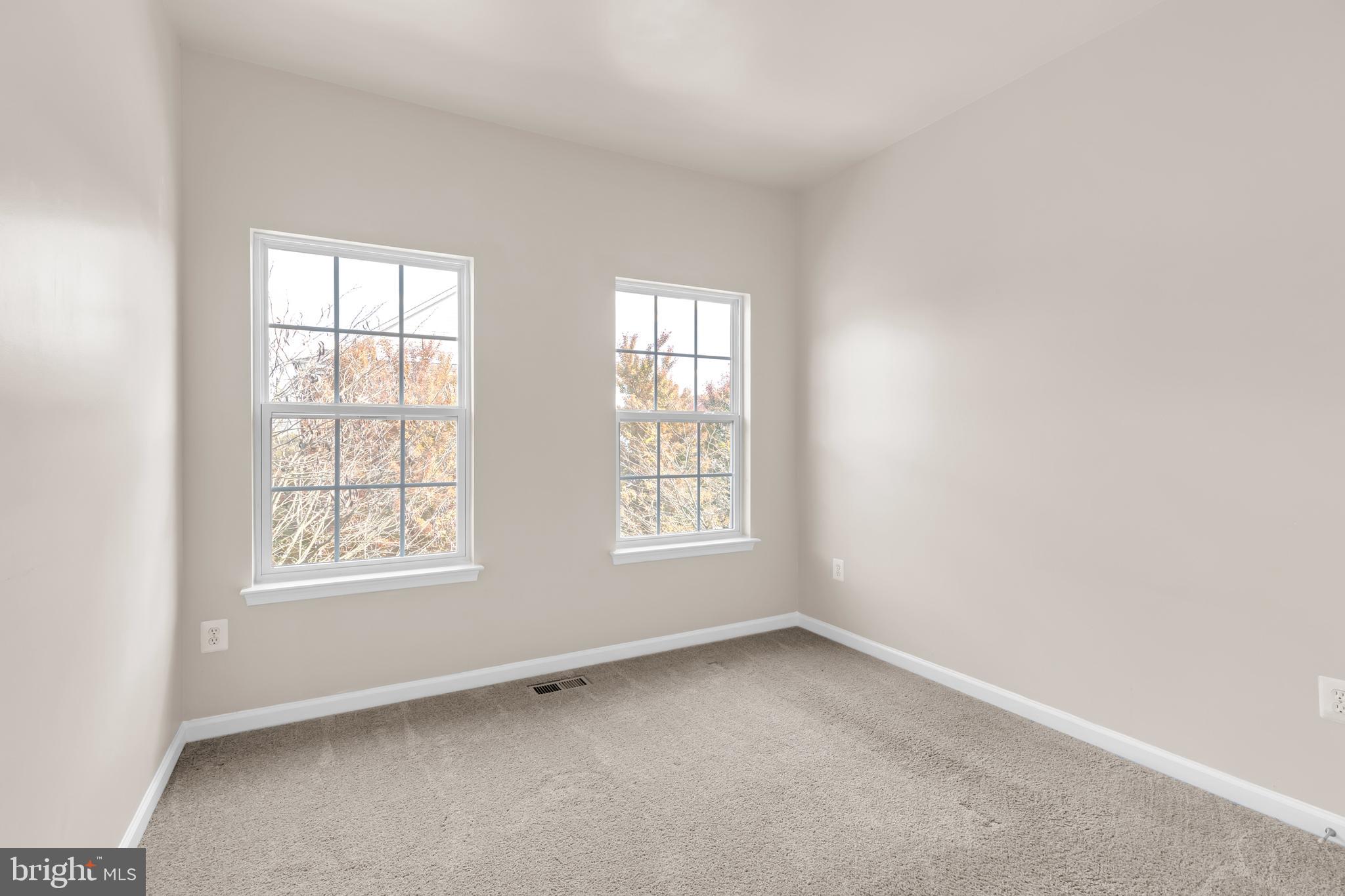 626 Tailgate Terrace Landover, MD 20785 - Photo 26 of 36 an empty room with windows