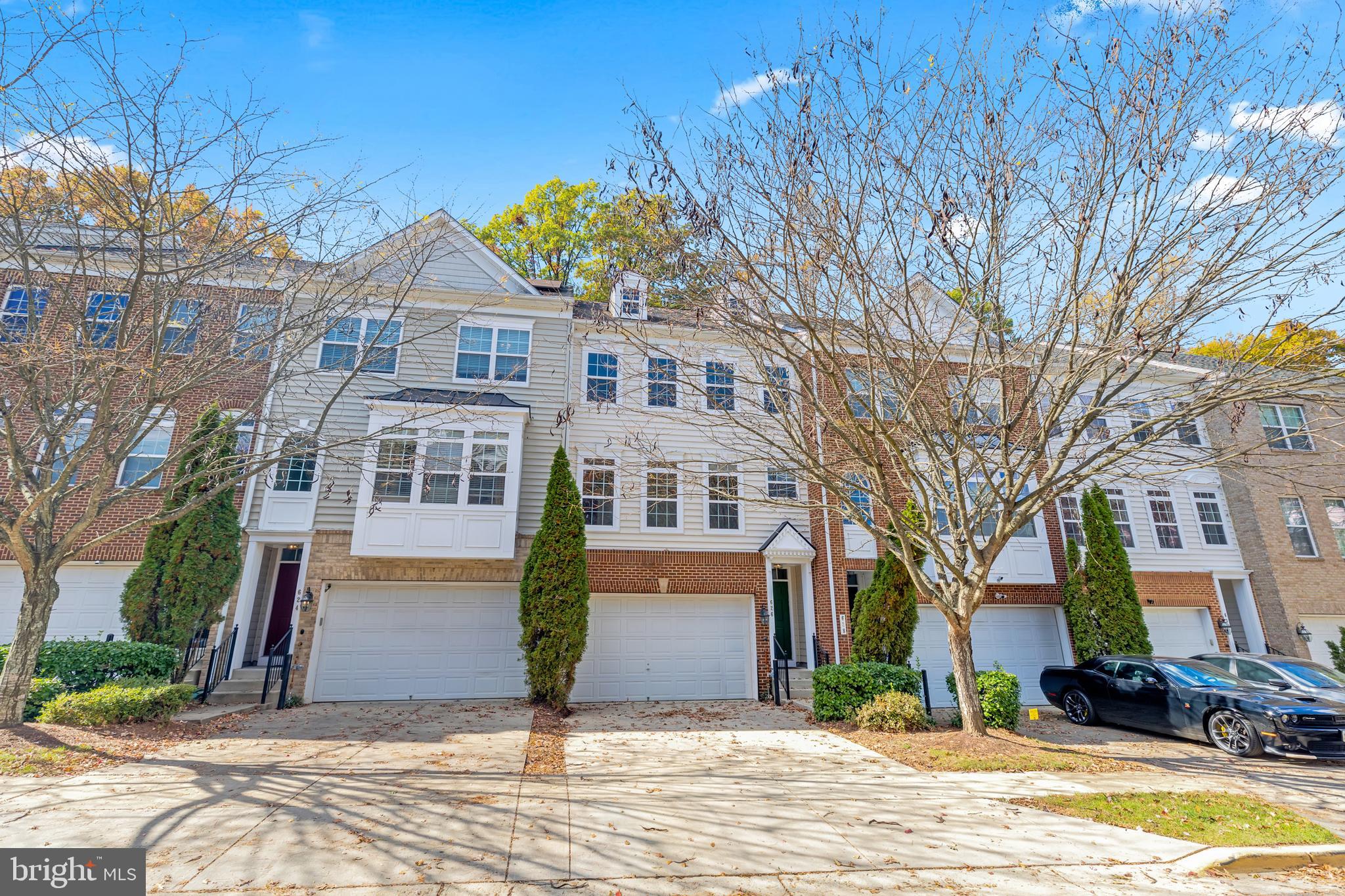 626 Tailgate Terrace Landover, MD 20785 - Photo 3 of 36 a front view of a house with a yard