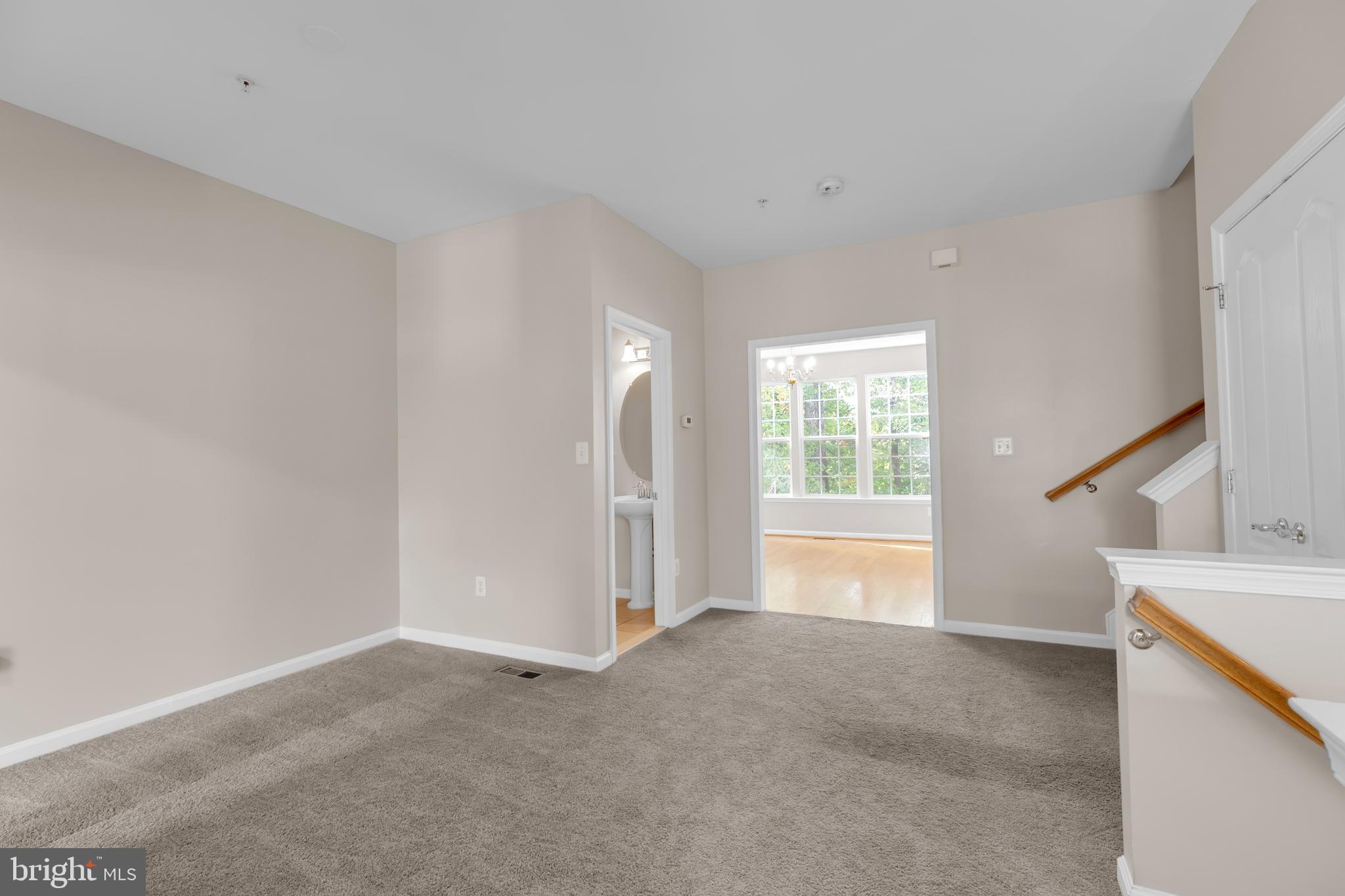 626 Tailgate Terrace Landover, MD 20785 - Photo 7 of 36 a view of livingroom with furniture and window