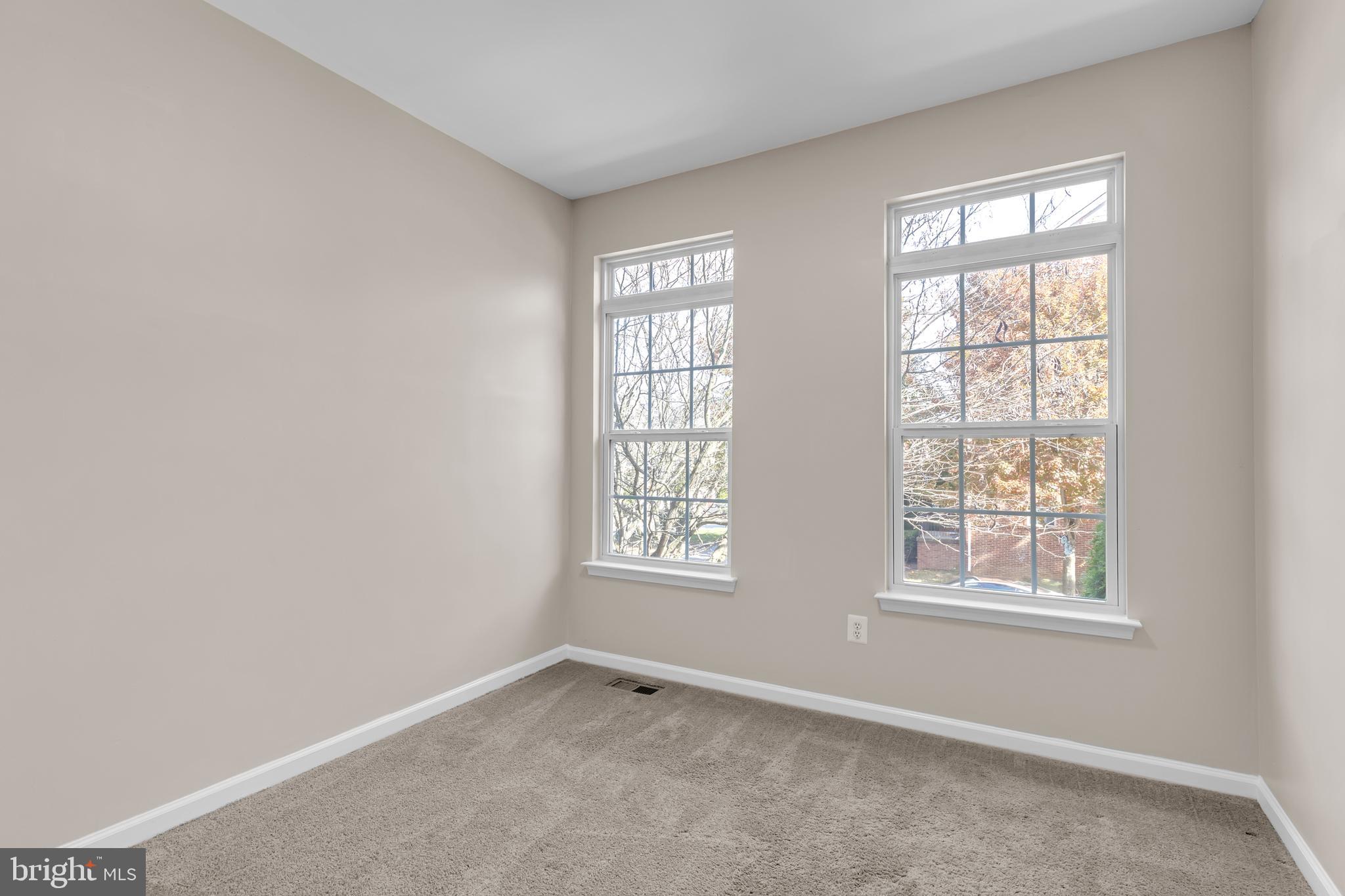 626 Tailgate Terrace Landover, MD 20785 - Photo 8 of 36 an empty room with windows