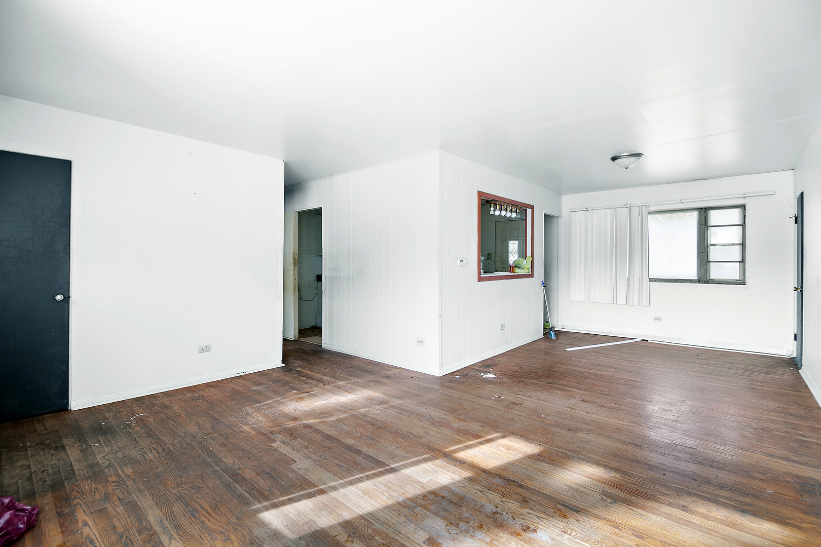 1869 Summit Avenue Kankakee, IL 60901 - Photo 11 of 13 an empty room with windows and closet