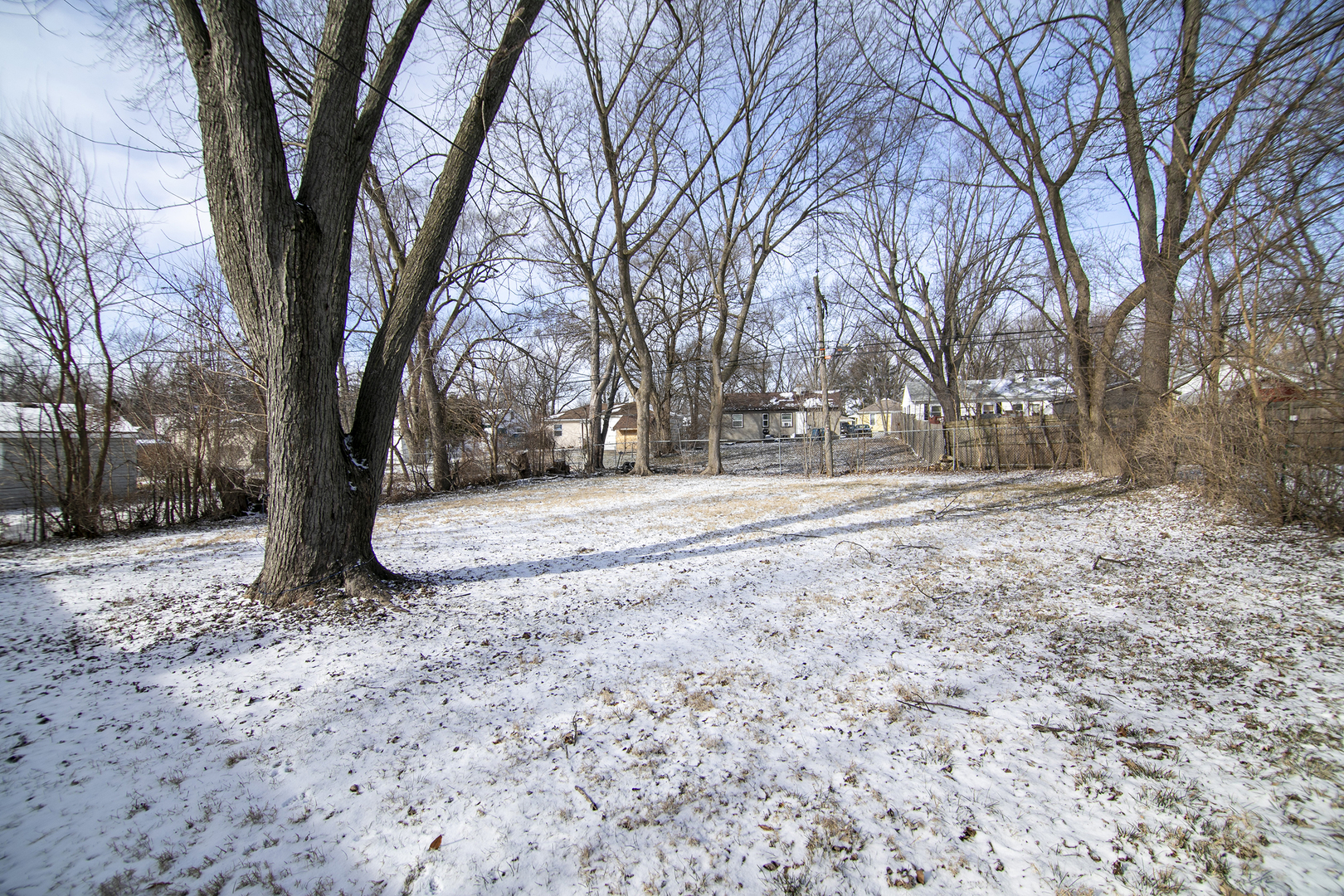 1869 Summit Avenue Kankakee, IL 60901 - Photo 2 of 13 a view of empty yard with trees