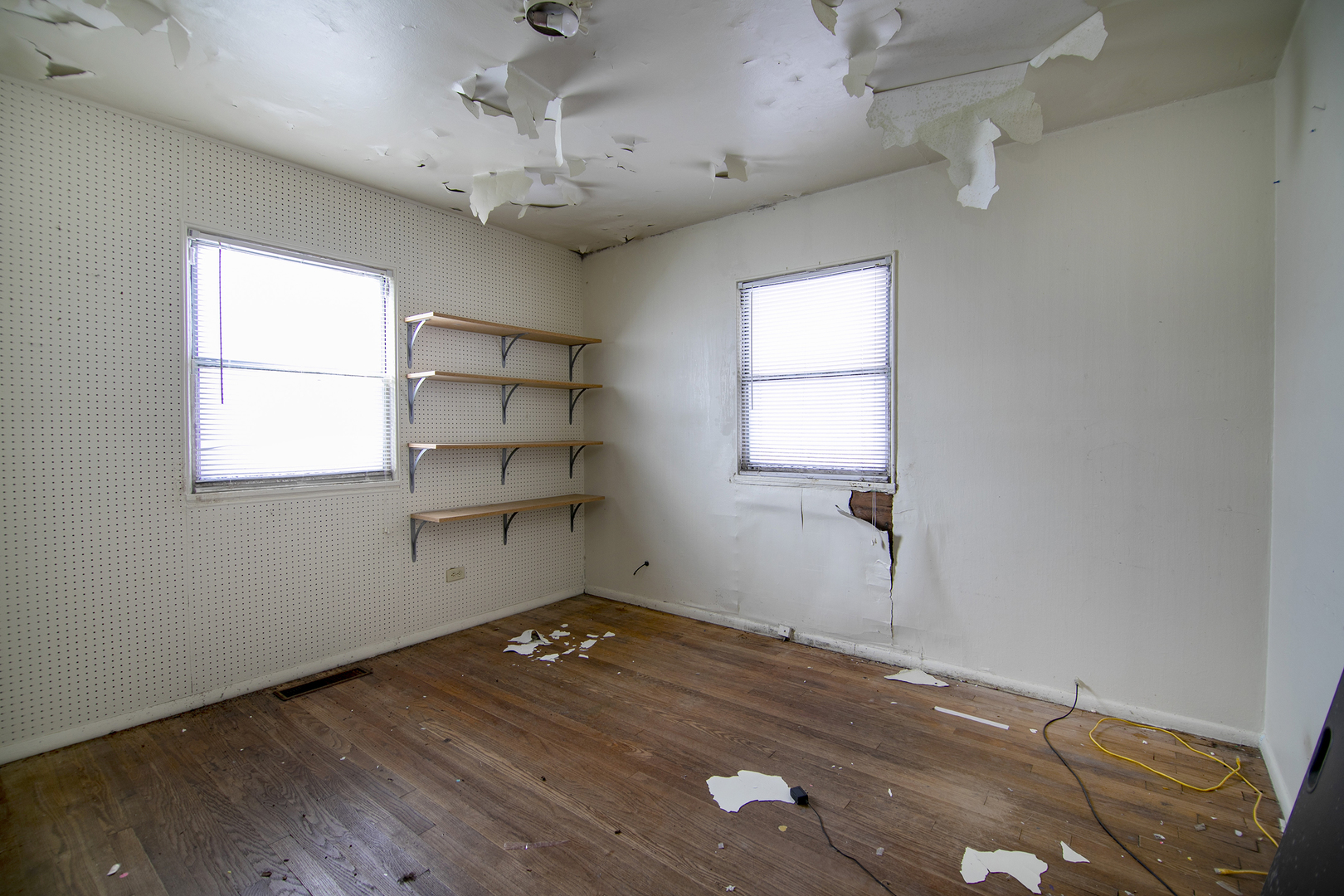 1869 Summit Avenue Kankakee, IL 60901 - Photo 5 of 13 wooden floor in an empty room with a window