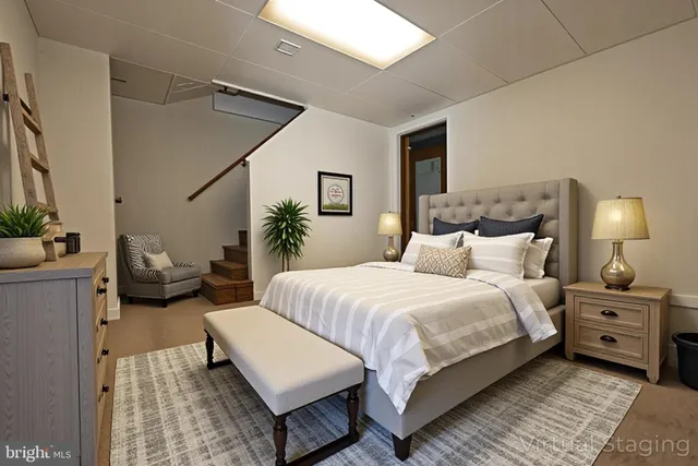 a front view of a house with a yard table and chairs