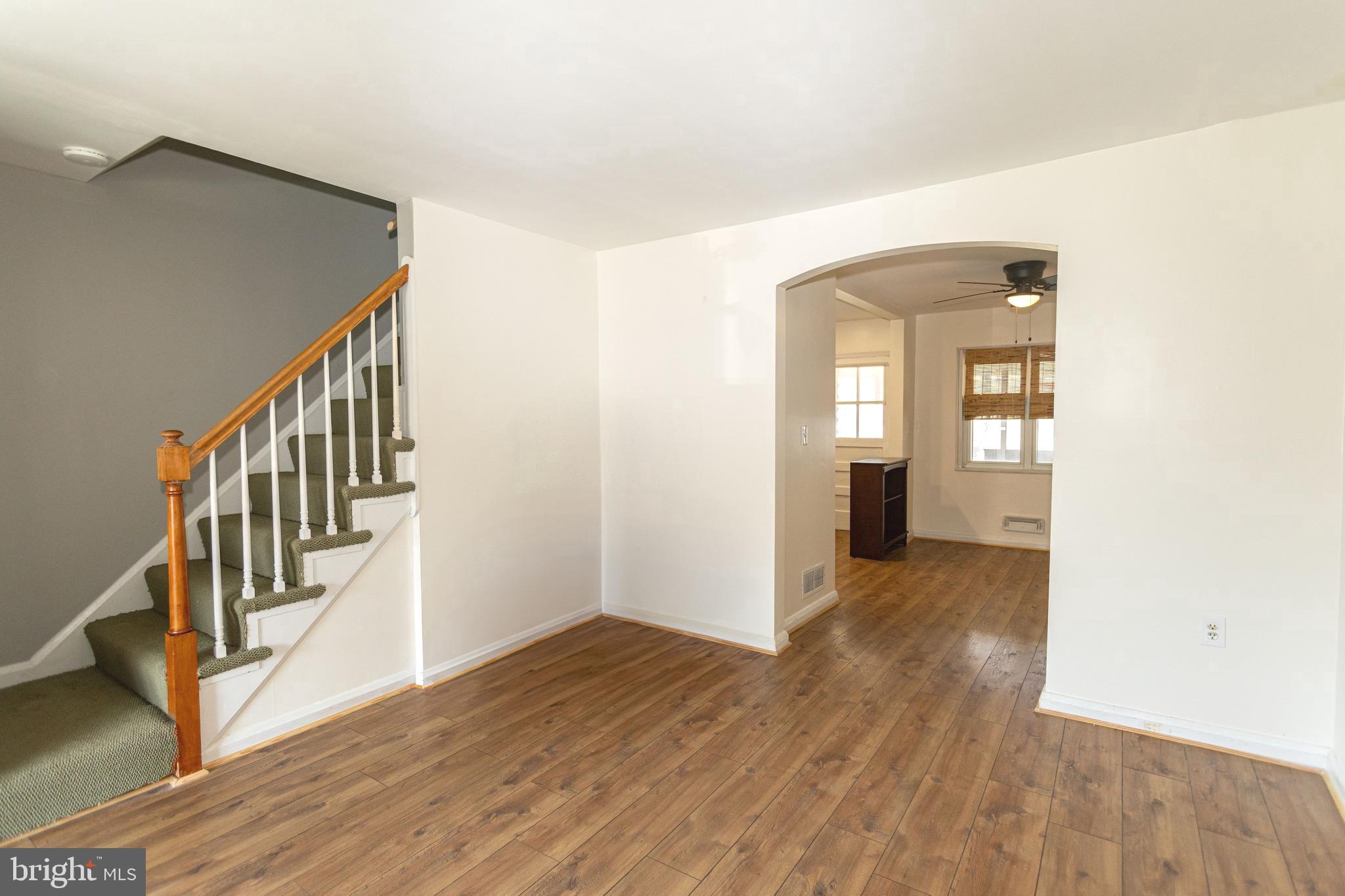 1940 Wareham Road Baltimore, MD 21222 - Photo 21 of 37 a view of an entryway with wooden floor and stairs