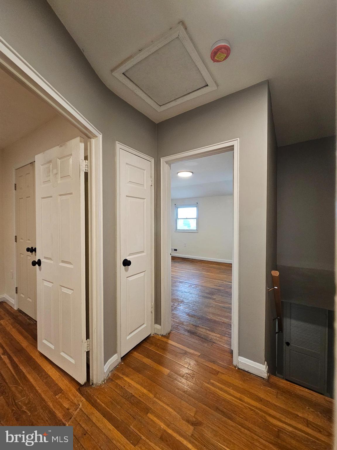 1940 Wareham Road Baltimore, MD 21222 - Photo 23 of 37 a view of a hallway with wooden floor and closet area