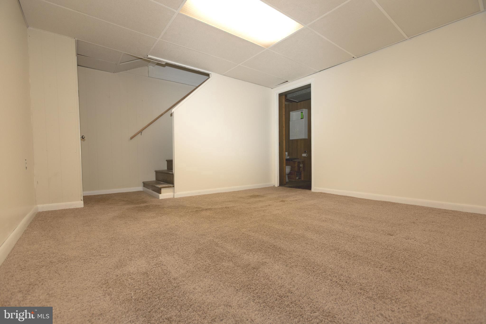 1940 Wareham Road Baltimore, MD 21222 - Photo 26 of 37 a view of an empty room with a window