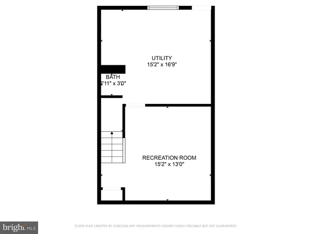 a picture of a bench in front of a wall