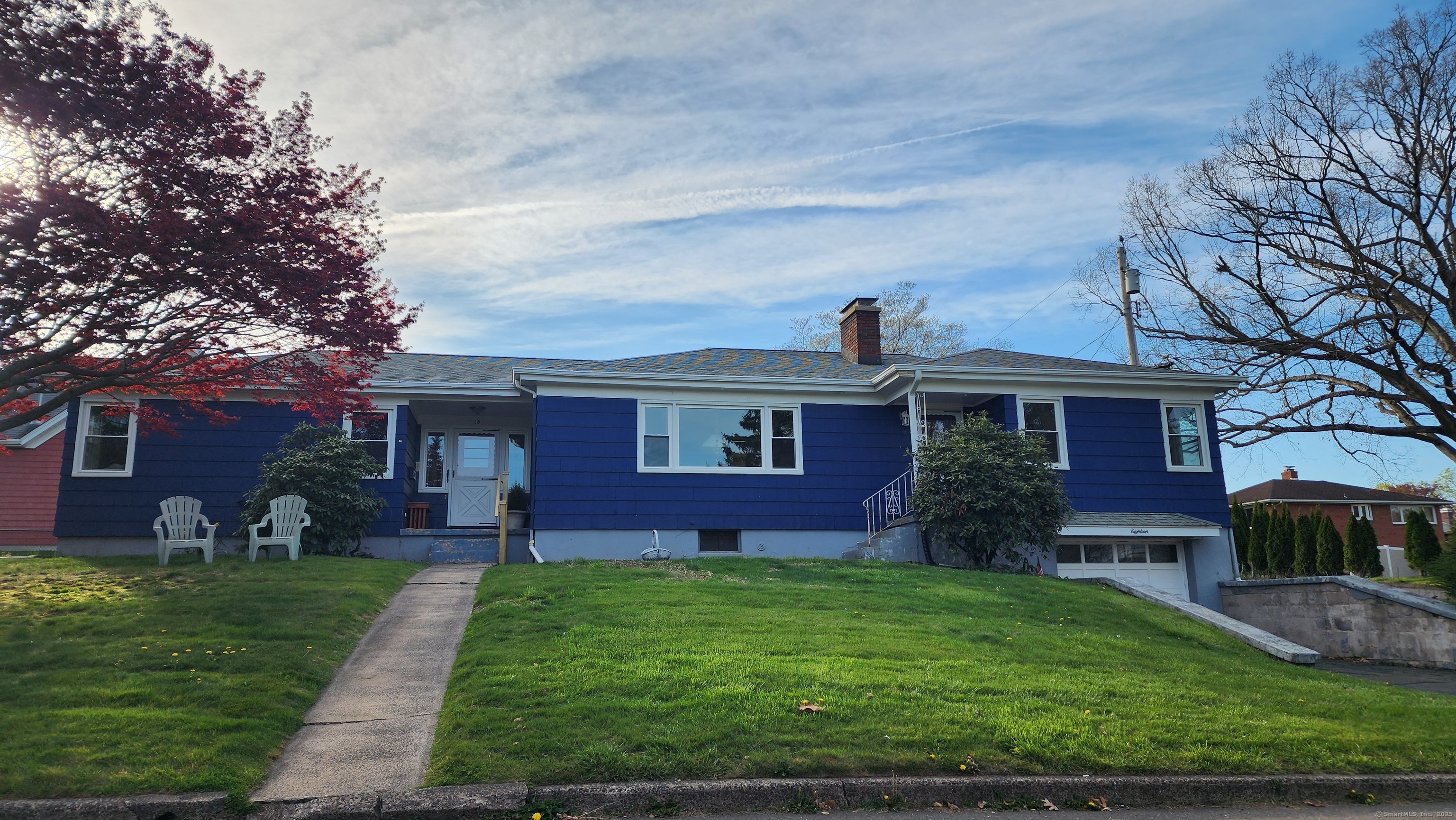 18 Lincoln Drive Wallingford, CT 06492 - Photo 1 of 1 a front view of a house with garden