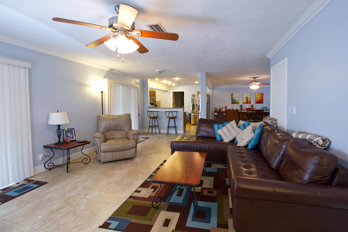 1026 West Camino Real Boca Raton, FL 33486 - Photo 6 of 32 06 Living Room Open to Kitchen