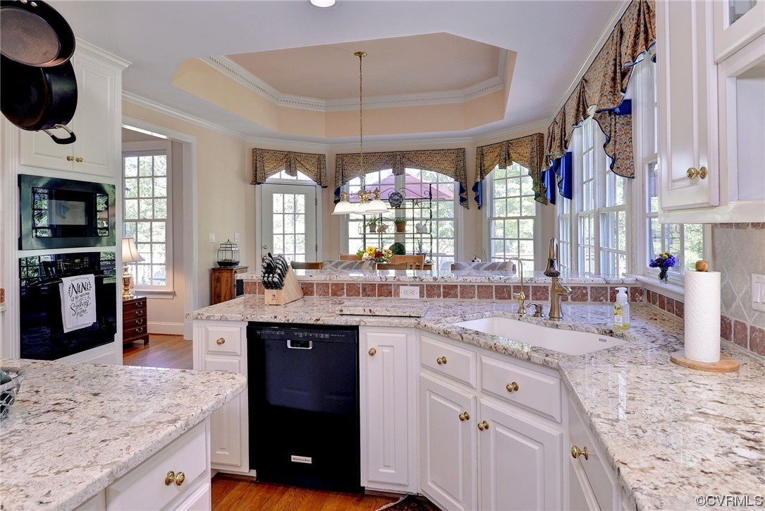 207 Shady Bluff Point Williamsburg, VA 23188 - Photo 15 of 49 a kitchen with stainless steel appliances granite countertop a sink and a stove