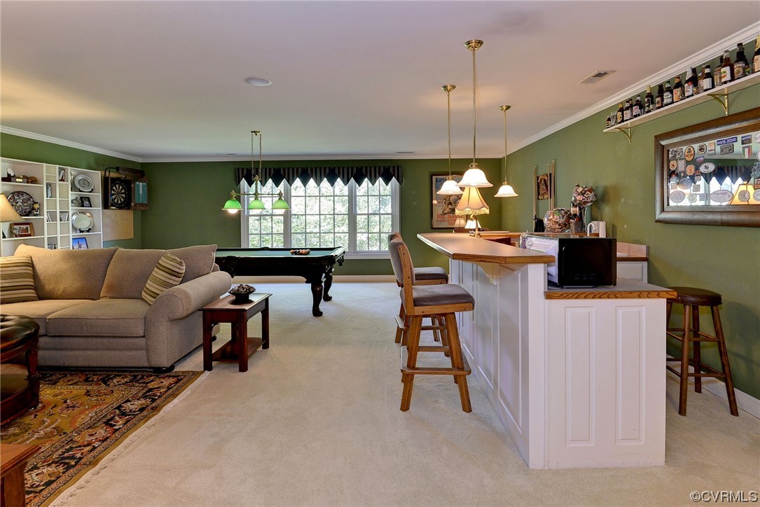 207 Shady Bluff Point Williamsburg, VA 23188 - Photo 23 of 49 a living room with furniture and a large window