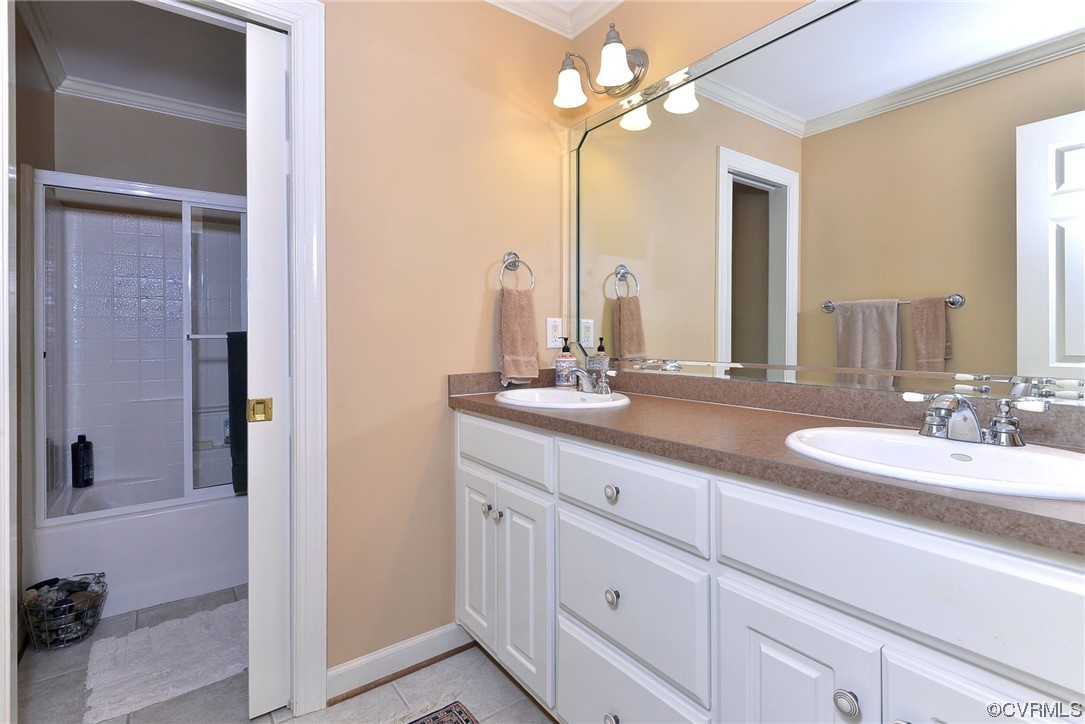 207 Shady Bluff Point Williamsburg, VA 23188 - Photo 28 of 49 a bathroom with a double vanity sink a mirror and a shower