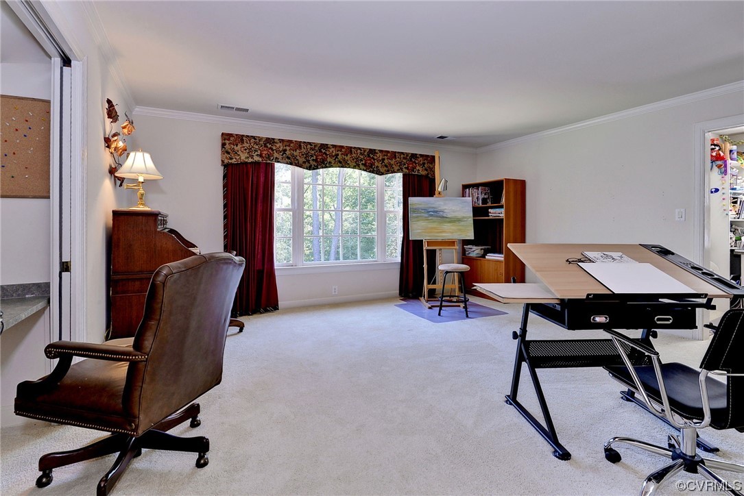 207 Shady Bluff Point Williamsburg, VA 23188 - Photo 30 of 49 a view of a workspace with furniture and a window