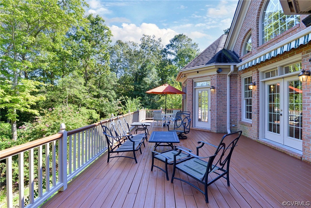 207 Shady Bluff Point Williamsburg, VA 23188 - Photo 31 of 49 a view of a patio with a table and chairs