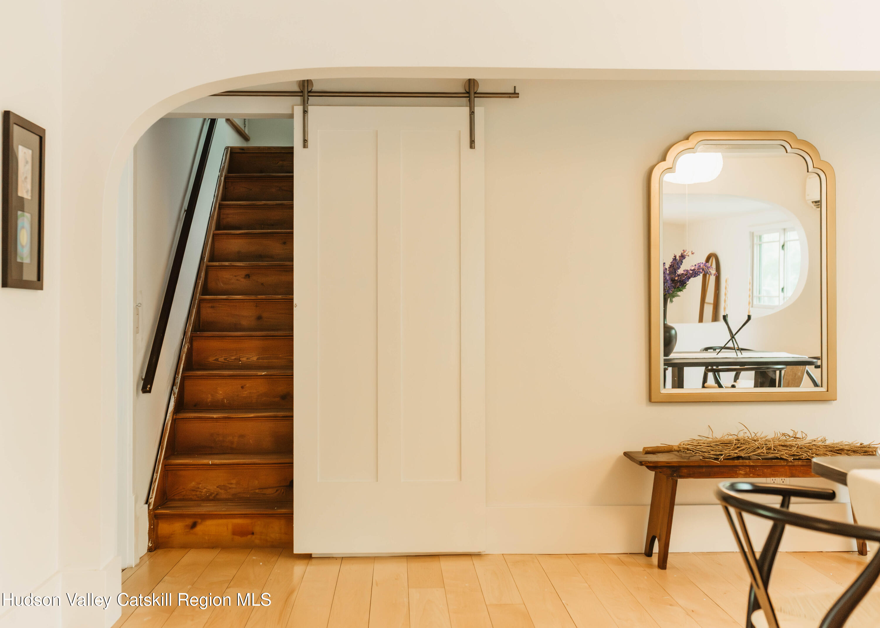675 Cooper Lake Road Woodstock, NY 12448 - Photo 16 of 31 a view of a hallway with entryway wooden floor and front door