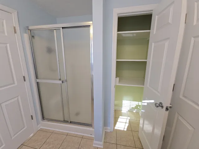 a view of bathroom with a shower