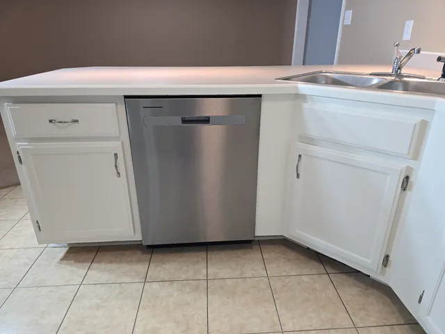 a utility room with washer and dryer
