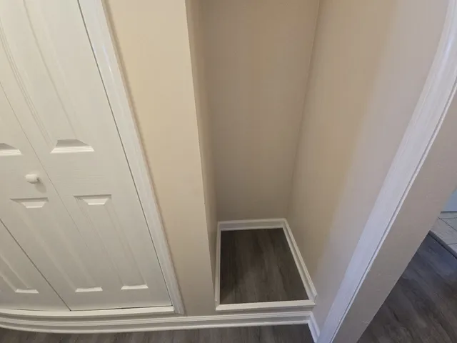 a bathroom with a glass door shower